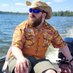 Adam on a boat (@ShealyTN) Twitter profile photo