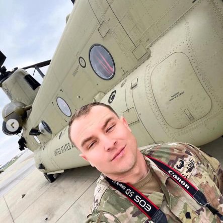 giveawaynft08's profile picture. A Military personnel