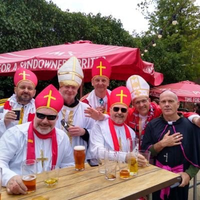 Group of friends from GU7 who follow Woking FC away “This town called malice” Lovers of weird back street real ale pubs before kick off