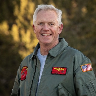 Professional Pilot, Board of Directors for Blue Angel Foundation, 5 Combat Tours, Stunt Pilot in TOPGUN Maverick, Key Note Speaker and Author.