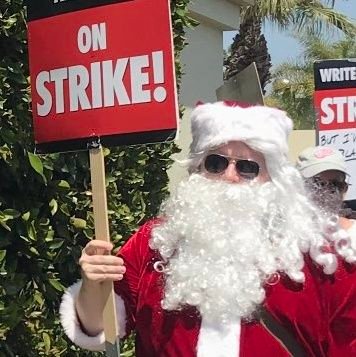 If you're seeking the dancing, protesting Santa, you've found it. Screenwriter.