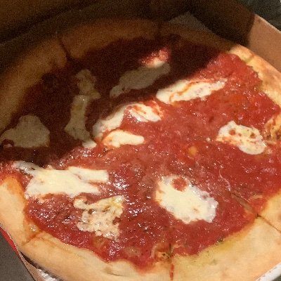 with unevenly spaced mozzarella that just doesn't melt