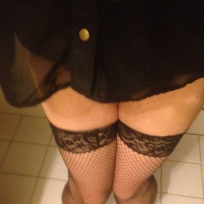 60 transvestite/crossdresser Melbourne wearing thigh high, black stockings, sexy black lingerie and lipstick red lips waiting for a guy keen on blow and go x