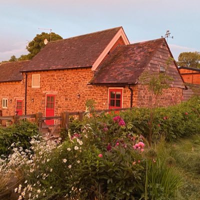 The Hayloft & The Forge, two self catering holiday cottages in a converted barn near Ludlow in the Shropshire hills. Dog friendly with hot tubs. #ruralluxury