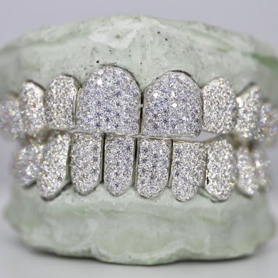 We specialize in custom moissanite Grillz and custom moissanite jewelry 🧊 All jewelry is made with real gold and silver! DIAMOND TESTER CERTIFIED