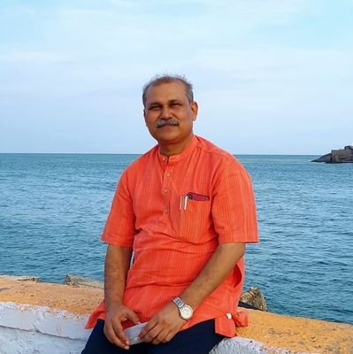 Professor of Hindi, Poet and Critic