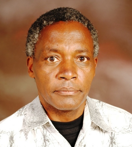 Male Kenyan social scientist promoting education for sustainable development at the grassroots level.