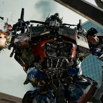 optimus prime getting his arm ripped off