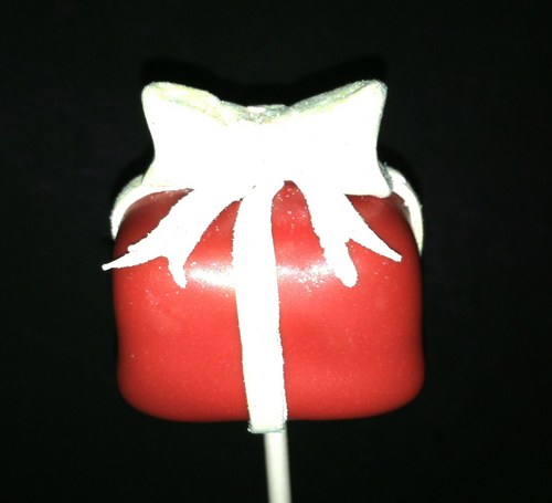 Gourmet Custom Cake Pops... Delicious cake on a stick dipped in chocolate. Made with the finest ingredients. Perfect for any occasion.