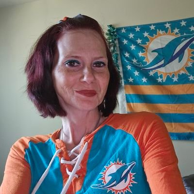I bleed Aqua and Orange. Dolphins football is my my life next to God and my family. #finsup🐬