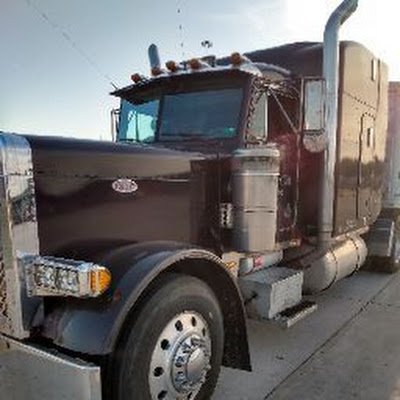 ANTI-COMMUNIST....... An American Diesel driving grain hauler and DAMN PROUD OF IT!!! If it wasn't for us, nobody would eat,  PERIOD END OF STORY!! TRUCKIN USA!