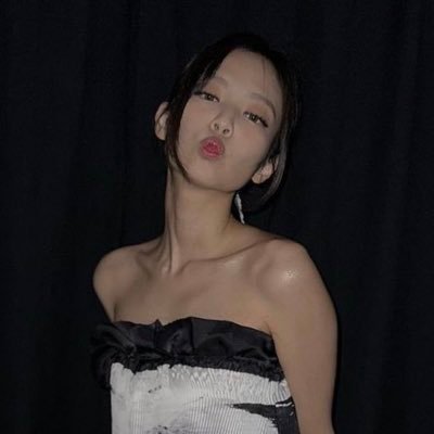 Beneath the radiant morning glow, amidst a pond adorned with blossoming lotus flowers, rested a lovely little girl, her name gracefully whispered as Jennie Kim.