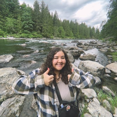 ardyyy__'s profile picture. the girl with curly hair.