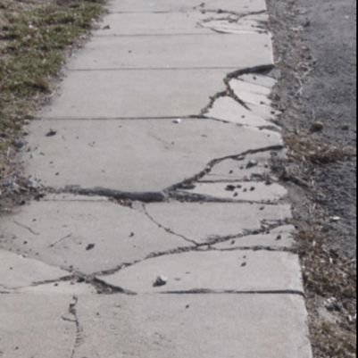 Just your average crumbling city sidewalk in Wpg