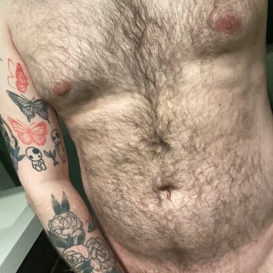 Just another hairy gay showing off his body.