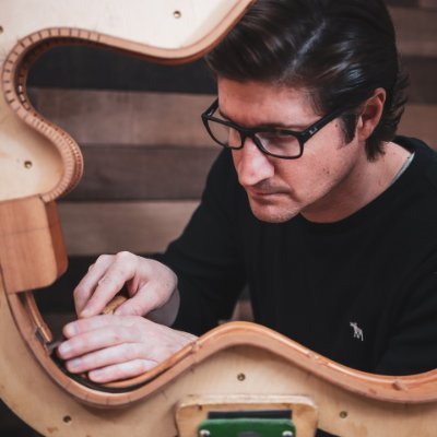 I help people learn the art of hand-crafting guitars through my free newsletter, articles, videos, and guitar-building school at https://t.co/NNXnipwCid