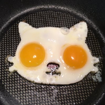 Just a lone cat cracking the narrative, one egg at a time. No egg-ceptions. Served with a side of snark.