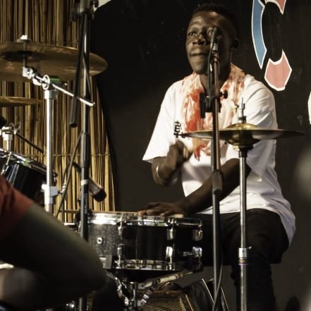 A Traditional Drummer/ Musician . 
A Kenyan.
loves Music .
A fun @Live band