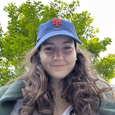 AmyKathWills's profile picture. Probably overdressed and watching a movie somewhere