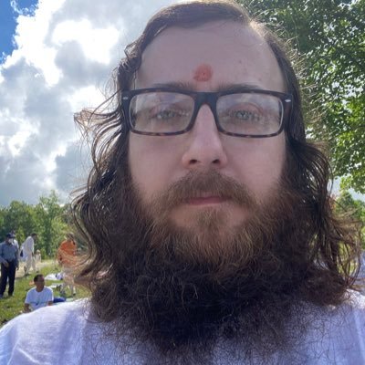 Isha volunteer/meditator, Save Soil city coordinator, Shaivite, U.S. Army veteran