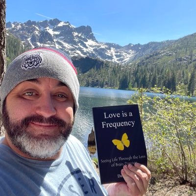 I am the author of the book Love is a Frequency: seeing life through the lens of brain damage. brain tumor / brain cancer survivor. overcame paralysis superhero