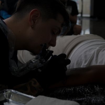 Tattooing at Doomsday Tattoo