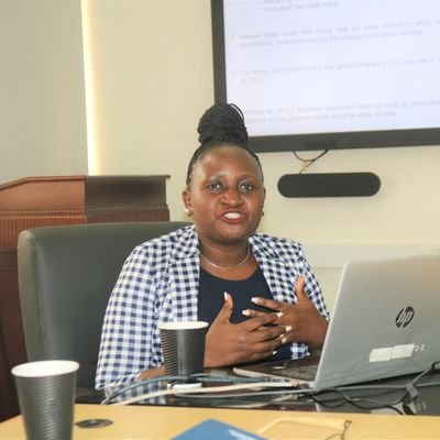 African woman, passionate about ethics of genomics and genetics research, ethics of AI