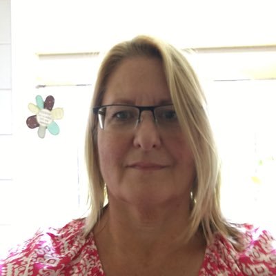 Educator, wife, mother, swimmer and rugby fan.