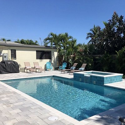 This spacious, newly renovated home includes a new in-ground, heated, salt-water pool and hot tub, surrounded by a nicely landscaped and private yard.