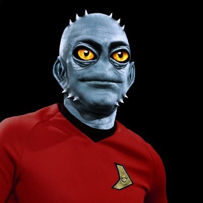 Member of unidentified species with amnesia (even he's not sure if MEIVRVN is the name of his people or his own name) adopted by Starfleet.

Seemingly immortal.