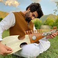 Kashmir's soulful melodies resonate through its music, a beautiful tapestry of culture and emotion. Explore the enchanting sounds of the valley. #KashmirMusic