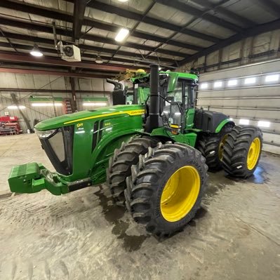 A fan of green farm equipment