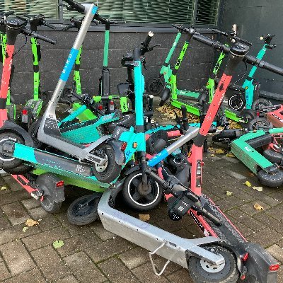 Let's pile up all e-scooters in the world to keep pedestrians and bicyclists safe.