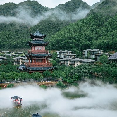 Gexian mountain is surrounded by clouds. In autumn, Gexian village is a quiet town