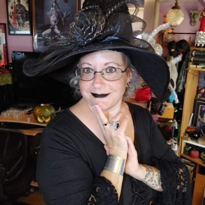 Gardnerian Wiccan High Priestess, Witch, Wife, Mom, Cat Lover, & Award Winning, Best Selling Author.