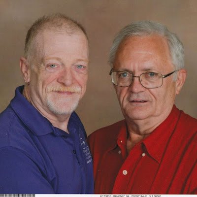 We are 2 happily married men. Together we own and operate Rainbow Bear Art Studio.  Thom, in the purple shirt is the artist.  Joe works on social media ect