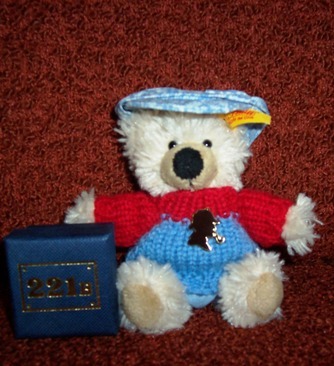 I am @Spencerteddy's adopted son and live with @ArthurConanbear and @Gilbertteddy. I hope I will be a good detective and come from Ollyted's house.