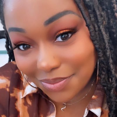 MUVAtheone's profile picture. somewhere between Michelle Obama & Cardi B.