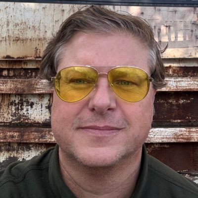 John Clay Wolfe Profile