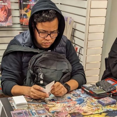 aspiring YouTuber: https://t.co/0bVBENTgmD, weekly writer @tcgplayer, formerly @konami. lifelong Duelist, 31 he/him. my tweets are my own. dms open!