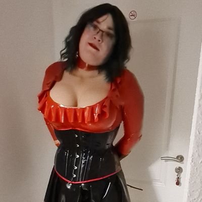 I love to show my female side, especially in shiny clothes and corsets. I love standing in front of the camera. Any kinky ideas? You can text me. I will answer!