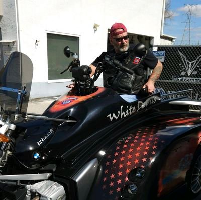 Paraplegic who rides a motorcycle and jumps (technically shoved) out of the WWII C-47 Skytrain Tico Belle. And a huge Nebraska fan.