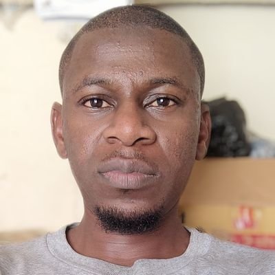 iam_embeekay's profile picture. Ambivert, simple, classic.