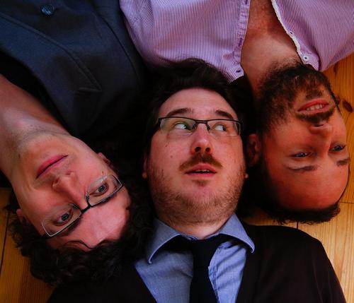 Three sketch-men.  It's satire, but not as you'll notice it.

'Brilliantly written, laugh out loud funny and intelligent comedy' - Frost Magazine