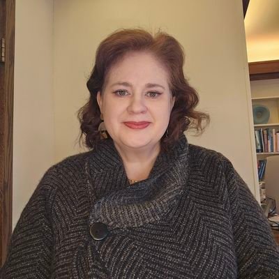 Mom to the coolest young folks ever, clinical psychologist, bibliophile, incompetent potter, lover of science, cats, vegetarian cooking & all things spooky.