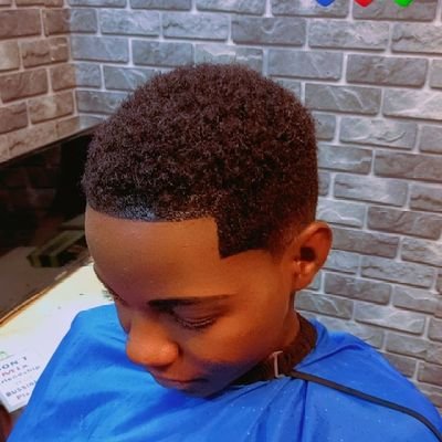 Beautifying the neighborhood, one haircut at a time. @+256778583866/754470664 wtsapp