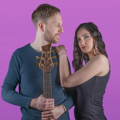 An unlikely duo of bass guitar and voice masquerading as pop music