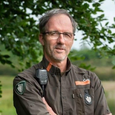 John is keeper of the Earth, Boswachter (forest ranger) in het Goois Natuurreservaat en redactielid vereniging politie dieren- en milieubescherming.