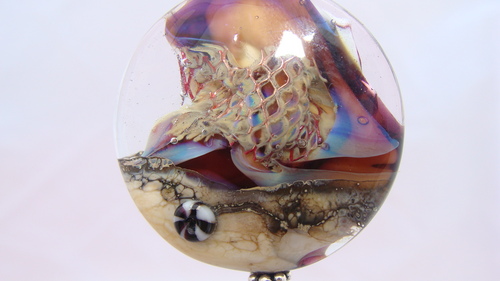 I am a self taught glass artist, working with glass since I was 15 and making glass beads is my heaven! Lets talk!