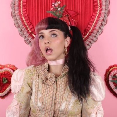 0phelian0there's profile picture. one of melanie martinez’s  #1 fans.
